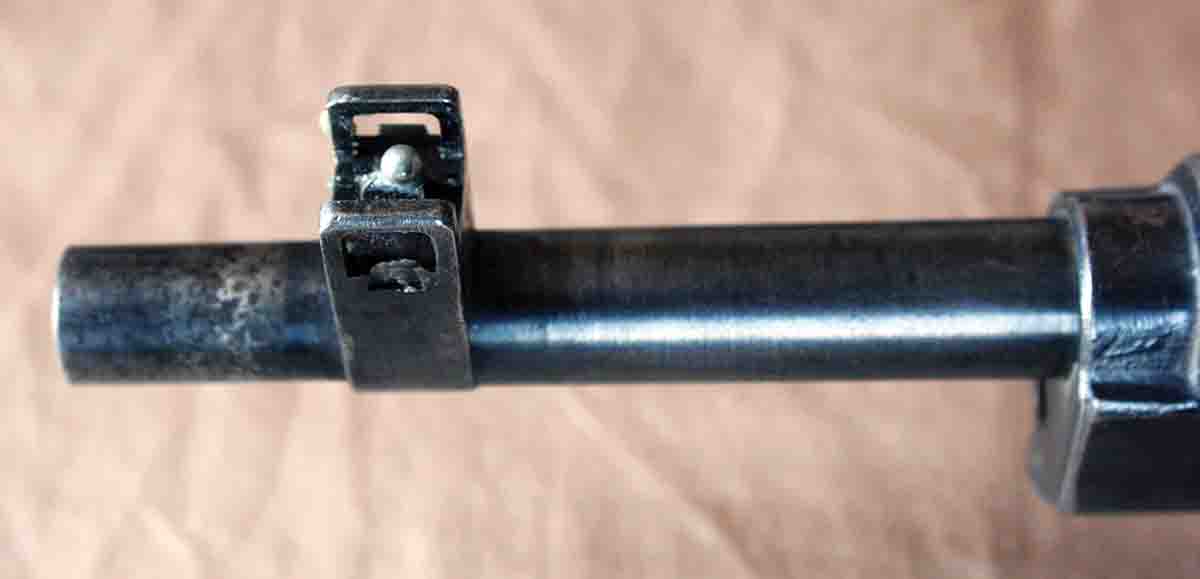 The front sight was regulated to shoot somewhat high, typical of many military sights. Adding a silver bead resulted in a much more useful zero for closer ranges.